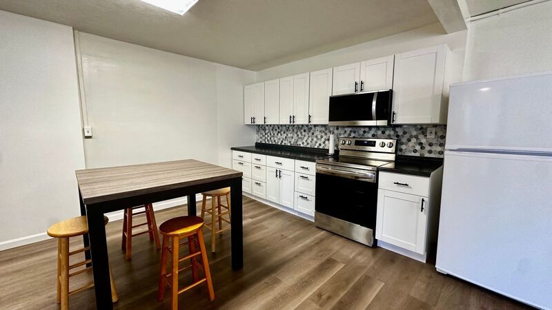 Available NOW - Highly Desired 2 BED 2 BATH with Den in lush Manoa Valley! property image