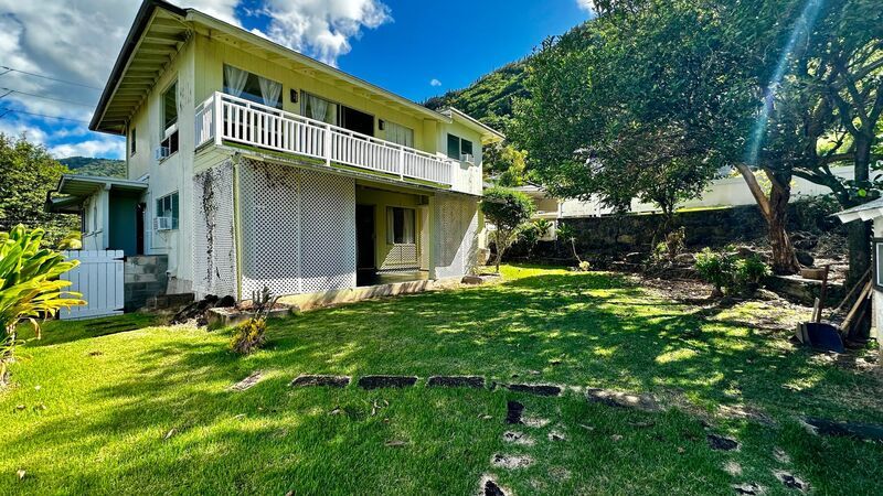 Available NOW - Highly Desired 2 BED 2 BATH with Den in lush Manoa Valley! property image